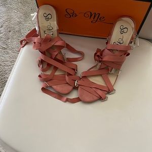 Size 9 laced up heel with clear back blush color brand new.